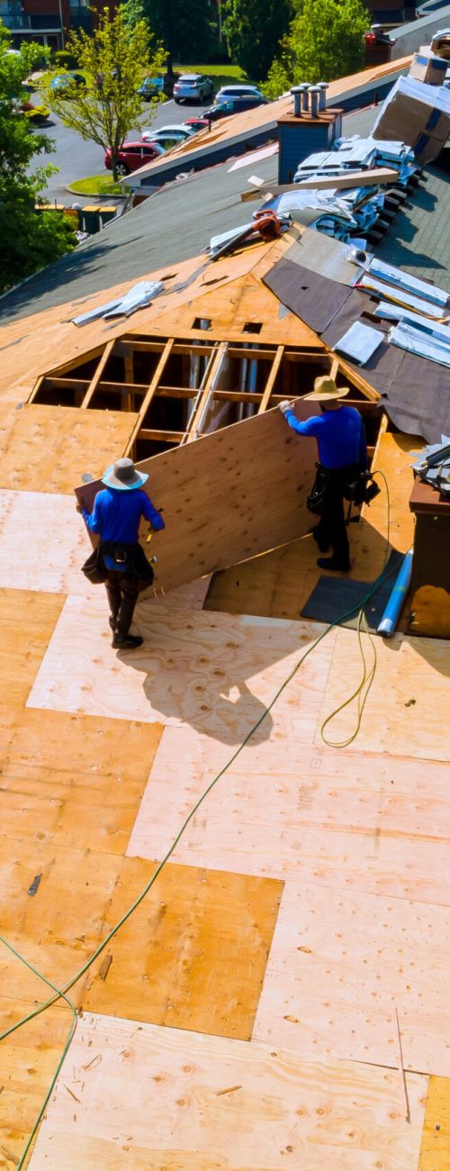 Replace old asphalt bitumen shingles on house roof in order to repair roof